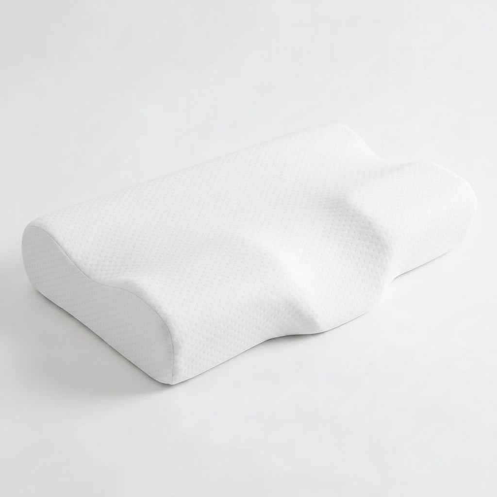 DreamAlign contour cervical pillow — white memory foam on light background