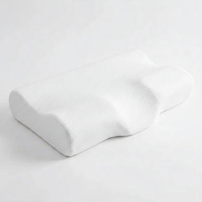 DreamAlign contour cervical pillow — white memory foam on light background